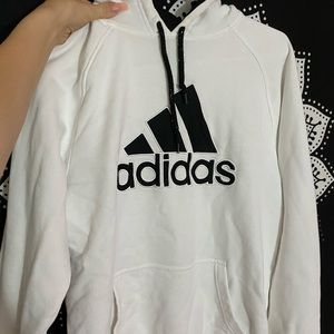 Oversized Adidas sweatshirt.